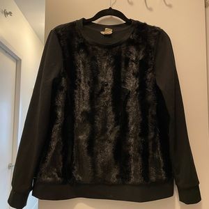 Like to ski?  Look chic on and off the slopes with this warm and fun sweater.